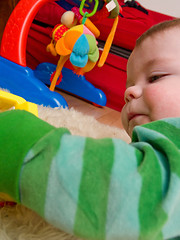 Image showing Cute little baby boy playing with toys