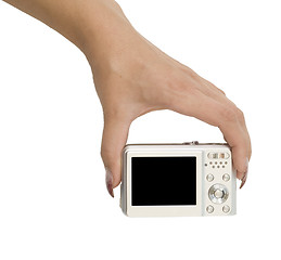 Image showing camera in a hand on white