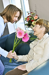 Image showing Granddaughter visiting grandmother