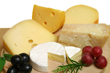 Image showing Cheeses and grapes