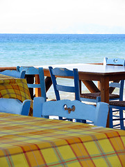 Image showing Blue chairs by the sea