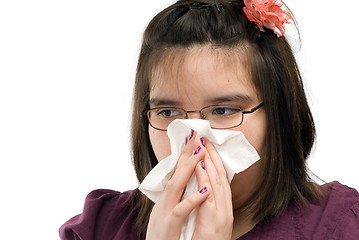Image showing Girl Blowing Nose