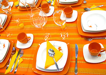 Image showing Orange table setting