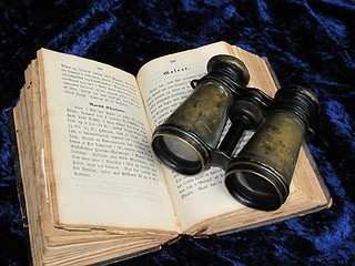 Image showing Old binoculars and cookbook