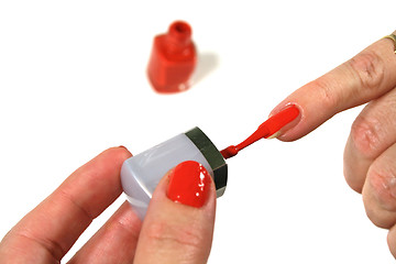 Image showing Female Painting Fingernails