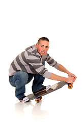 Image showing Handsome smiling skaterboy