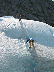 Image showing Two ice climbers: teamwork