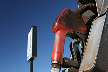 Image showing gas pump with sign