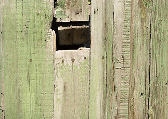 Image showing hole in wooden fence