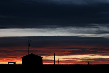 Image showing house in setting sun