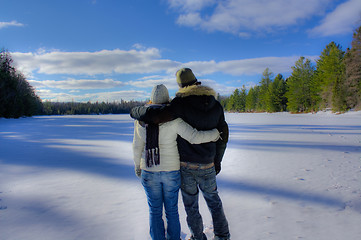 Image showing a couple overlooking snow field in Algonquin Park.