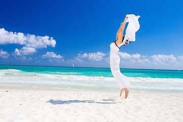 Image showing happy woman with white sarong