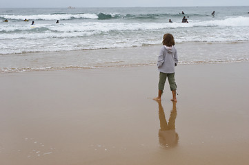 Image showing girl looking at ocean