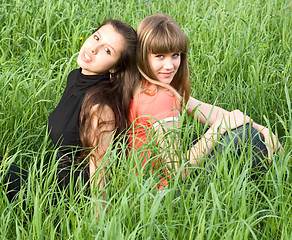 Image showing girls in green grass