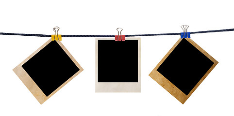 Image showing grunge photo frame on a rope