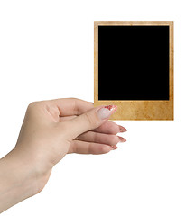 Image showing photo in a hand