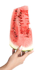 Image showing slice of an watermelon in a hand 