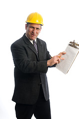 Image showing excited contractor with clipboard