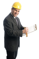 Image showing excited contractor with clipboard