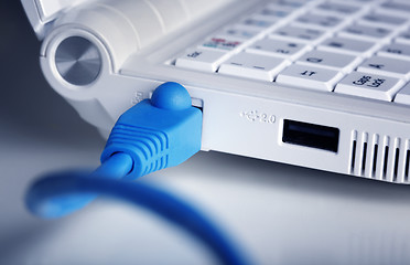 Image showing computer with an internet cable