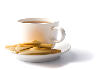 Image showing cup of tea and some cookies