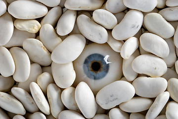 Image showing human eye and white haricot beans