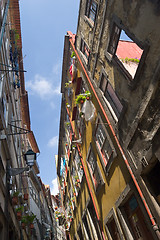 Image showing narrow street with flowers