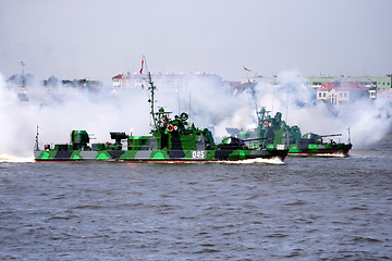 Image showing Military ship is shooting