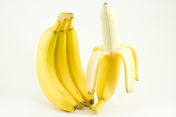 Image showing Four bananas on light background