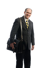 Image showing happy smiling business executive with leather attache travel bag