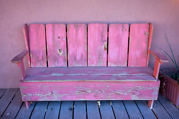 Image showing Pink wooden bench