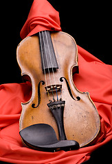 Image showing violin on silk