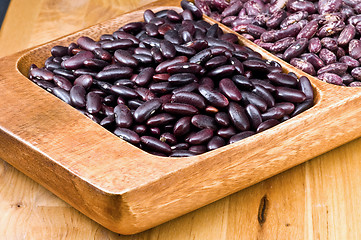 Image showing Kidney beans in wooden dish