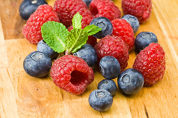 Image showing Blueberry and rasperry with mint leaves