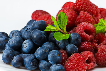 Image showing Blueberry and rasperry with mint leaves