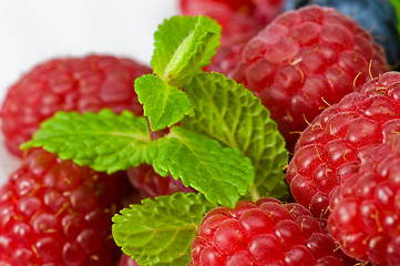 Image showing Blueberry and rasperry with mint leaves