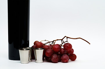 Image showing Cups, grapes, vine still life