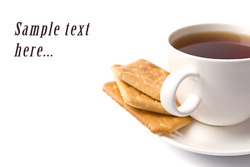 Image showing cup of tea and some cookies