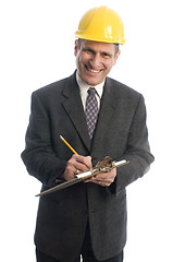 Image showing happy man writing contract estimate