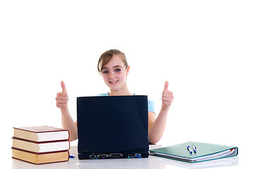 Image showing Teenager girl on desk