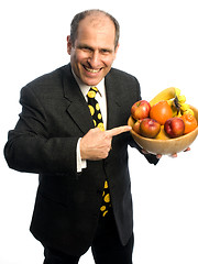 Image showing happy healthy man with bowl of fruit