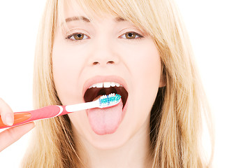 Image showing happy girl with toothbrush