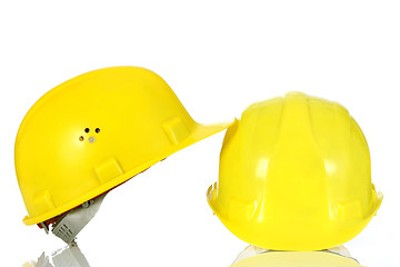 Image showing two yellow helmet