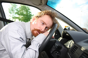 Image showing driver sleeps in a car