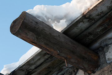 Image showing Wooden roof, drooping snow 2