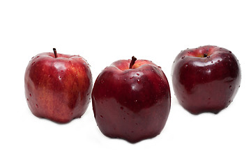 Image showing Three red apples