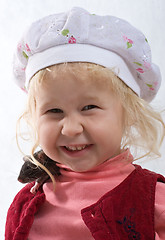 Image showing smiling baby with rat