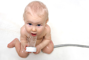 Image showing cute baby with the shower