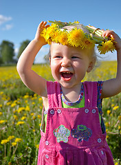 Image showing happy girl with dandelion wreath