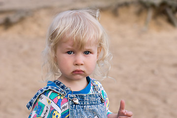 Image showing blonde sad little girl